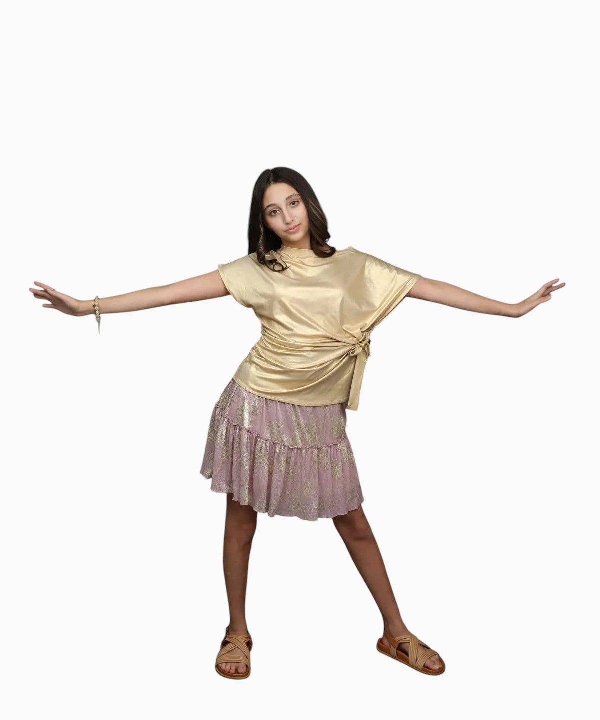 Nounami two-piece set with a metallic gold short-sleeve top and a dusty rose tiered skirt with gold foil print.